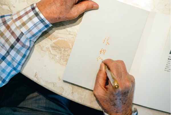 Anke signing book